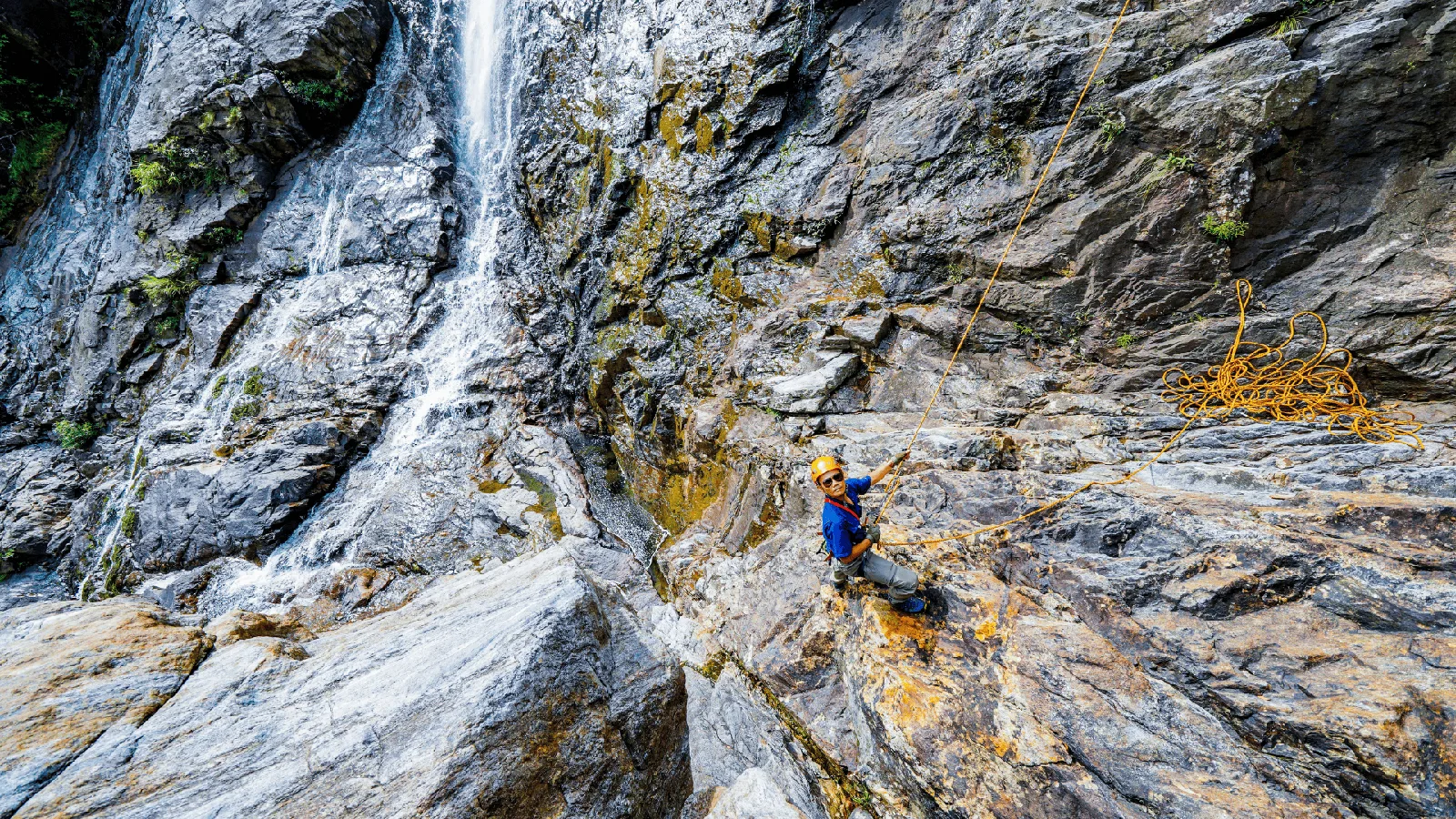 Canyoning beside the waterfall